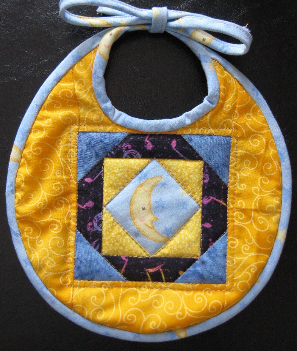 Fly Me to the Moon quilted baby bib
